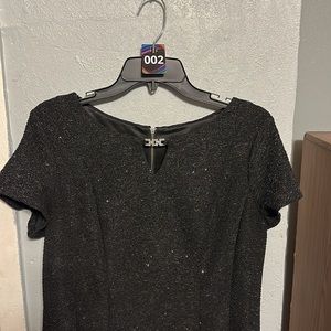 Black dress with silver sparkles  Ptp 20.  Long 38